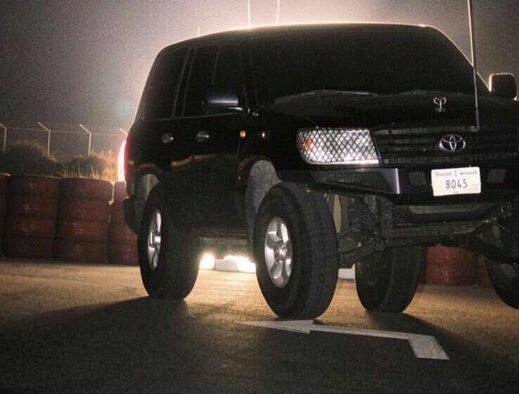 Night session · paddock — Toyota Land Cruiser LC 100 SideWheelie at Emirates Motorplex